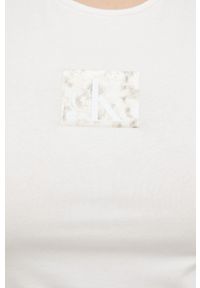 Calvin Klein Jeans top damski kolor biały. Kolor: biały. Długość rękawa: na ramiączkach. Wzór: nadruk #4