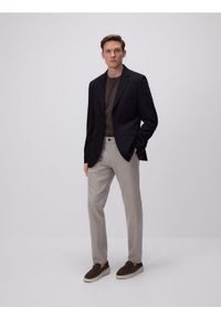 Reserved - Spodnie chino slim z wiskozą - beżowy. Kolor: beżowy. Materiał: wiskoza