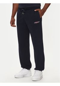 Guess Jeans Spodnie dresowe M4YB18 K9V31 Granatowy Regular Fit. Kolor: niebieski. Materiał: bawełna