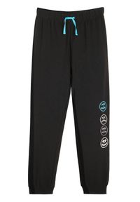 bonprix - Spodnie dresowe z miękkiej mieszanki bawełny. Kolor: czarny. Materiał: dresówka, materiał, bawełna. Wzór: nadruk