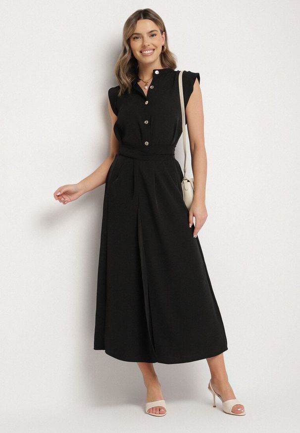 Born2be - Czarna Sukienka Koszulowa o Rozkloszowanym Kroju z Wiązaniem w Pasie Mavirielle. Okazja: na co dzień. Typ kołnierza: dekolt w serek. Kolor: czarny. Materiał: skóra. Długość rękawa: długi rękaw. Typ sukienki: koszulowe. Styl: casual, elegancki