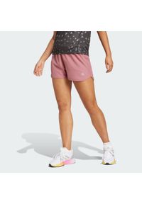 Adidas - Szorty Run It. Kolor: czerwony, wielokolorowy, różowy. Materiał: materiał. Sport: bieganie