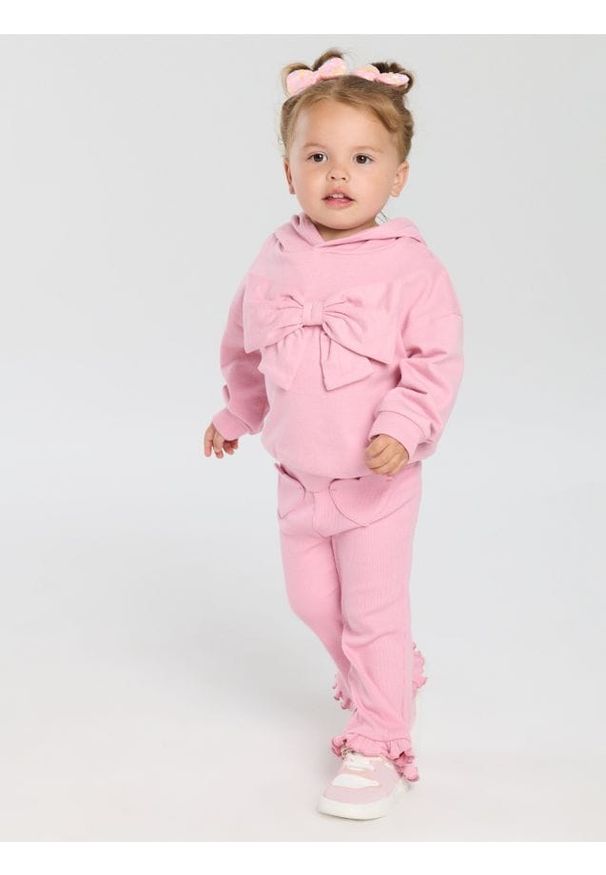 Sinsay - Bluza z ozdobną kokardą - różowy. Typ kołnierza: kokarda. Kolor: różowy