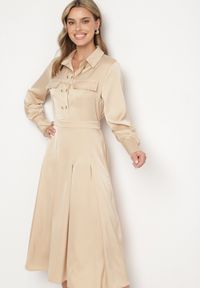 Born2be - Beżowa Rozkloszowana Sukienka o Koszulowym Kroju z Imitacją Kieszeni i Gumką w Talii Rizza. Okazja: na co dzień. Kolor: beżowy. Typ sukienki: koszulowe. Styl: wizytowy, klasyczny, casual, elegancki #7