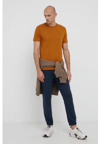 Calvin Klein Spodnie męskie kolor granatowy z nadrukiem. Kolor: niebieski. Wzór: nadruk