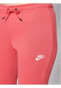 Nike Spodnie dresowe Essential BV4099 Różowy Slim Fit. Kolor: różowy. Materiał: bawełna, dresówka #5