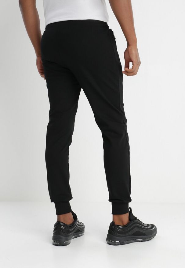 Born2be - Czarne Spodnie Katyse. Okazja: na co dzień. Kolor: czarny. Materiał: dresówka, bawełna, tkanina. Wzór: aplikacja, nadruk. Styl: elegancki, sportowy, casual