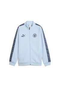 Puma - Młodzieżowa kurtka Manchester City KING Anthem PUMA Silver Sky Deep Navy Blue. Kolor: niebieski