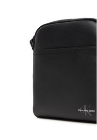 Calvin Klein Jeans Saszetka Mono Logo Reporter 18 LV04G3014G Czarny. Kolor: czarny. Materiał: skóra