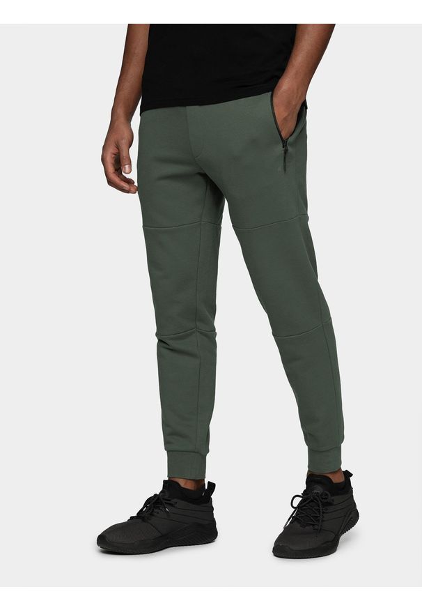 4f - Spodnie dresowe męskie Wilfredo Leon x 4F. Kolor: szary. Materiał: dresówka