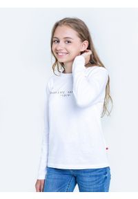 Big-Star - Bluzka dziewczęca longsleeve biała Brina 101. Okazja: na co dzień, na uczelnię. Kolor: biały. Materiał: jeans, bawełna. Długość rękawa: długi rękaw. Długość: długie. Wzór: nadruk, aplikacja. Styl: młodzieżowy, casual #3