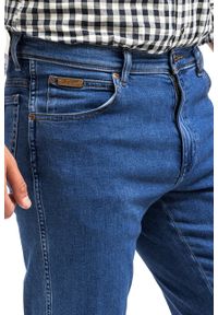 Wrangler - WRANGLER TEXAS SLIM MĘSKIE SPODNIE JEANSOWE THE STONE RIDE W12SYI39U. Okazja: na spotkanie biznesowe. Styl: biznesowy, elegancki