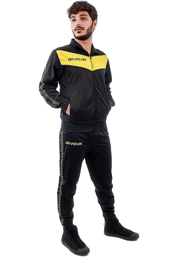 Dres z paskami Givova Visa. Kolor: czarny, wielokolorowy, żółty. Materiał: dresówka. Sport: piłka nożna