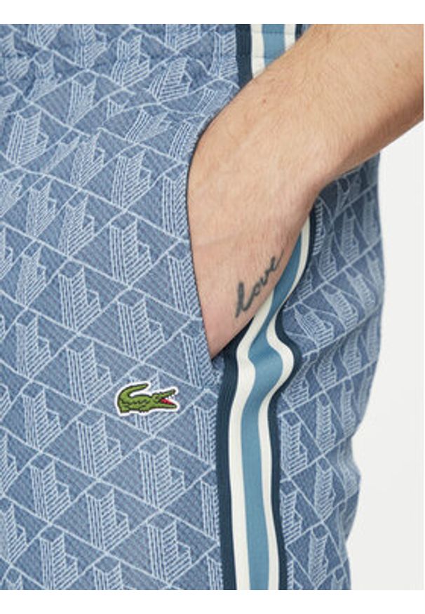 Lacoste Spodnie dresowe XH1440 Niebieski Regular Fit. Kolor: niebieski. Materiał: bawełna, syntetyk
