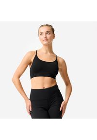 Decathlon - Stanik sportowy prążkowany. Kolor: czarny. Materiał: poliester, poliamid, materiał, elastan. Sport: joga i pilates #1