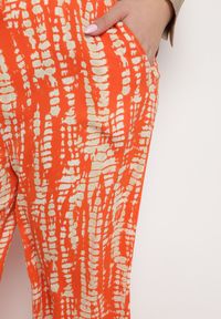Born2be - Pomarańczowe Szerokie Spodnie z Wysokim Stanem i Gumką w Pasie Miffiana. Stan: podwyższony. Kolor: pomarańczowy. Wzór: nadruk #4