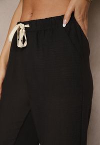 Renee - Czarne Spodnie High Waist z Szeroką Nogawką i Gumką w Pasie Mirarena. Okazja: na co dzień, na spotkanie biznesowe, do pracy. Stan: podwyższony. Kolor: czarny. Styl: biznesowy, elegancki, casual #3