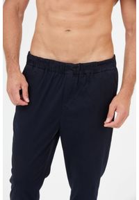 7 FOR ALL MANKIND Granatowe spodnie męskie Jogger Chino, Rozmiar L. Kolor: niebieski. Materiał: bawełna #3