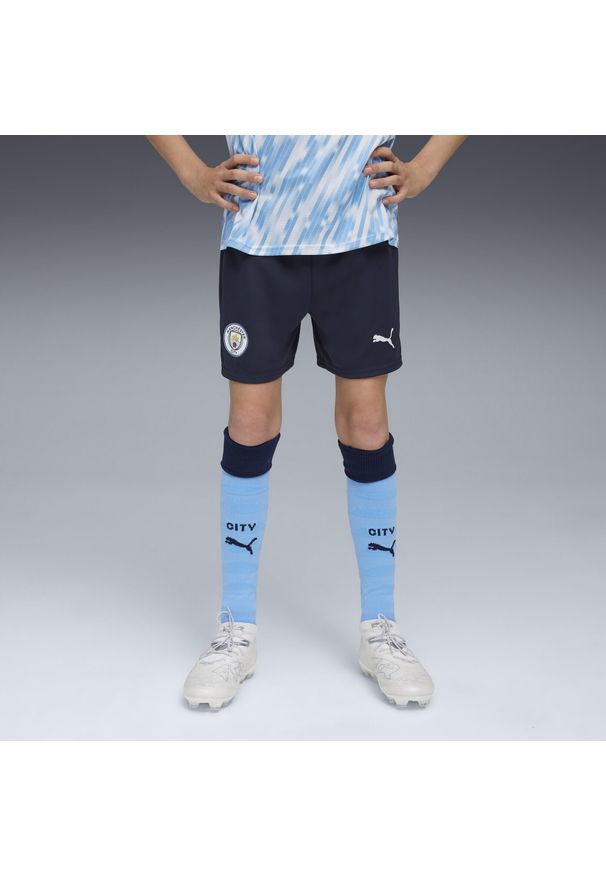 Puma - Młodzieżowe szorty Manchester City 25/26 PUMA Deep Navy Team Light Blue. Kolor: niebieski. Materiał: tkanina. Sport: piłka nożna