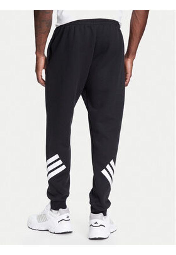 Adidas - adidas Spodnie dresowe Future Icons 3-Stripes JD4863 Czarny Regular Fit. Kolor: czarny. Materiał: syntetyk, bawełna