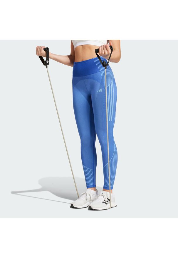 Adidas - Legginsy Seamless Branded 7/8. Kolor: niebieski. Materiał: materiał. Sport: fitness