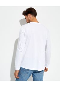 Lacoste - LACOSTE - Biała koszulka z długim rękawem. Kolor: biały. Materiał: prążkowany. Długość rękawa: długi rękaw. Długość: długie #3