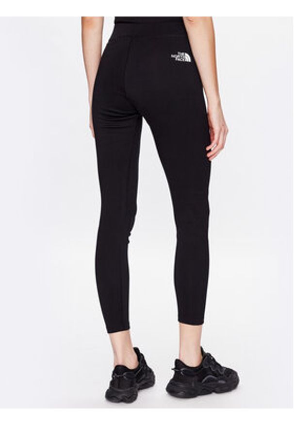 The North Face Legginsy Interlock NF0A7ZGI Czarny Slim Fit. Kolor: czarny. Materiał: bawełna