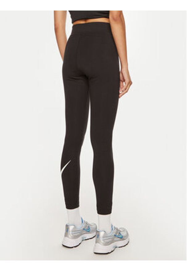 Nike Legginsy DV7795 Czarny Tight Fit. Kolor: czarny. Materiał: bawełna, syntetyk