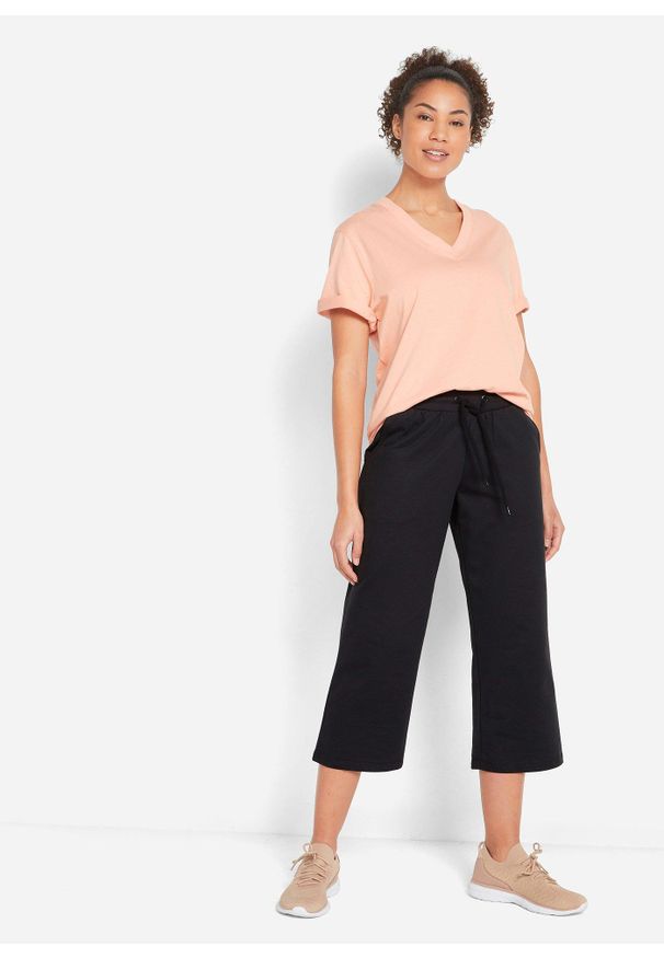 bonprix - Spodnie dresowe z bawełny organicznej, dł. do łydki. Kolor: czarny. Materiał: dresówka, bawełna