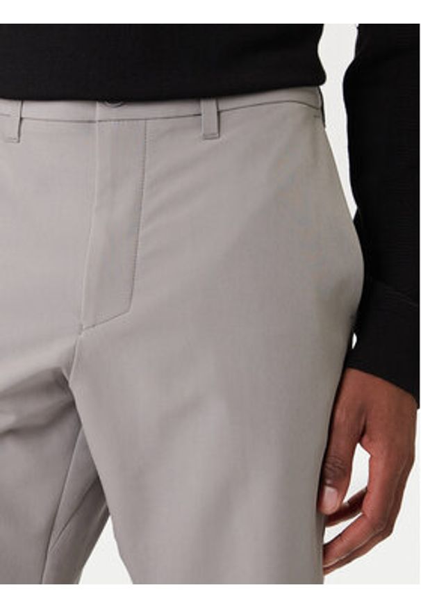 BOSS Spodnie materiałowe T_Commuter 50534303 Beżowy Slim Fit. Kolor: beżowy. Materiał: syntetyk