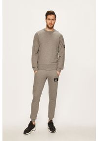Calvin Klein Jeans - Spodnie. Kolor: szary. Materiał: bawełna, materiał, dzianina, elastan. Wzór: gładki, melanż #3