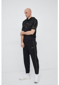 Emporio Armani spodnie dresowe kolor czarny z nadrukiem. Kolor: czarny. Materiał: dresówka. Wzór: nadruk #2