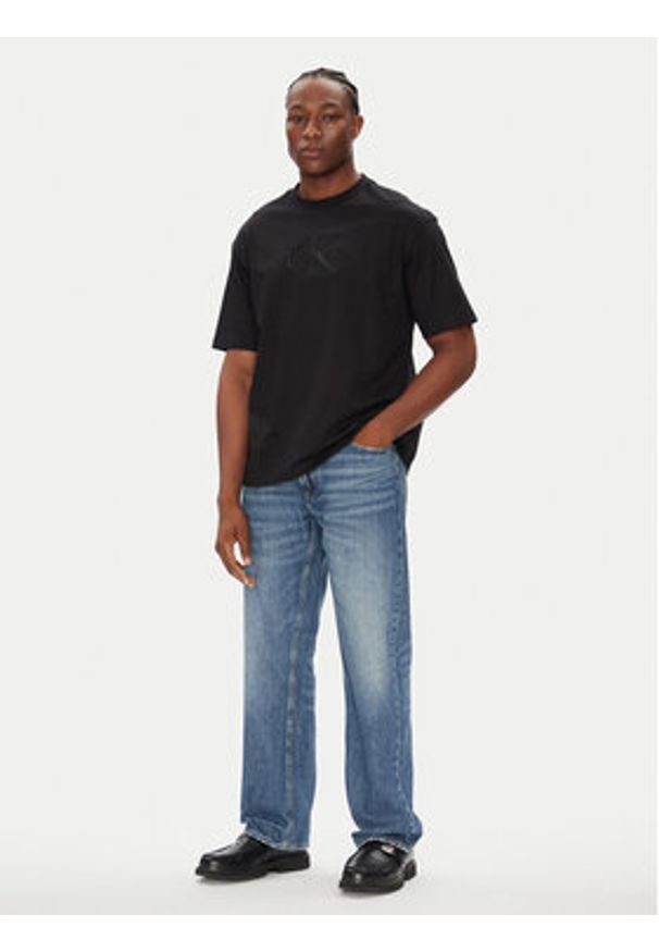 Calvin Klein Jeans T-Shirt Hero Monologo LV04RB295G Czarny Relaxed Fit. Kolor: czarny. Materiał: bawełna