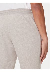 TOMMY HILFIGER - Tommy Hilfiger Spodnie dresowe UM0UM03664 Beżowy Regular Fit. Kolor: beżowy. Materiał: syntetyk, bawełna #3