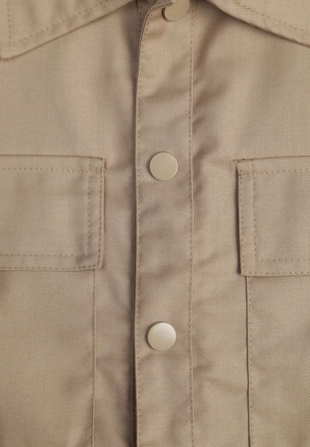 Born2be - Beżowy Kombinezon bez Rękawów Zapinany na Guziki z Materiałowym Paskiem Tiamarlia. Okazja: na co dzień. Kolor: beżowy. Materiał: materiał. Długość rękawa: bez rękawów. Styl: klasyczny, casual