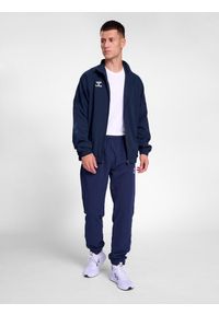 Kurtka z dresu Hummel Travel. Kolor: niebieski. Materiał: dresówka