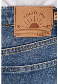 Superdry jeansy męskie. Kolor: niebieski