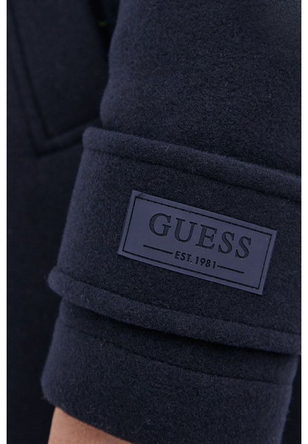 Guess - Płaszcz z domieszką wełny. Okazja: na co dzień. Kolor: niebieski. Materiał: wełna. Wzór: gładki. Styl: casual
