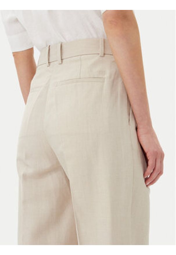 TOMMY HILFIGER - Tommy Hilfiger Spodnie materiałowe WW0WW45461 Beżowy Tapered Fit. Kolor: beżowy. Materiał: len