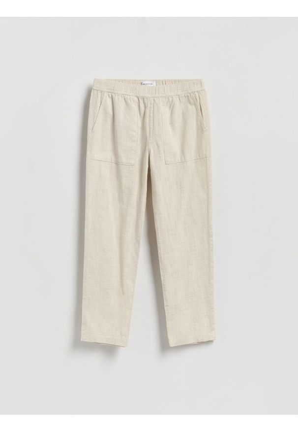 Reserved - Bawełniane spodnie jogger - złamana biel. Materiał: bawełna