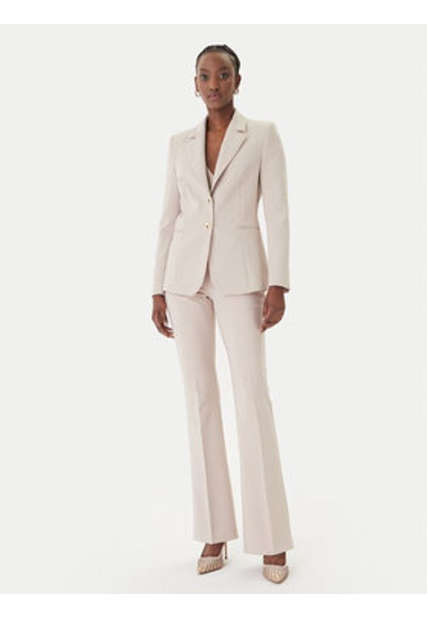 Rinascimento Spodnie materiałowe CFC0127876003 Beżowy Slim Fit. Kolor: beżowy. Materiał: syntetyk