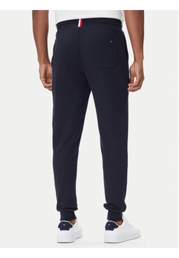 TOMMY HILFIGER - Tommy Hilfiger Spodnie dresowe Basic Branded MW0MW08388 Granatowy Regular Fit. Kolor: niebieski. Materiał: bawełna