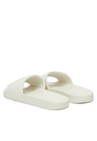 Calvin Klein Jeans Klapki Slide Monologo Cv YM0YM01367 Biały. Kolor: biały. Materiał: materiał #4