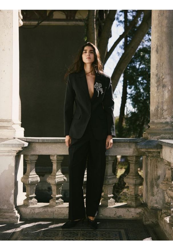 Reserved - Garniturowe spodnie z wełną - czarny. Kolor: czarny. Materiał: wełna