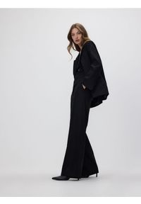 Reserved - Marynarka z połyskującą nicią - czarny. Kolor: czarny. Materiał: tkanina, wiskoza #1