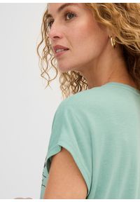 bonprix - T-shirt z brokatowym nadrukiem. Kolor: zielony. Wzór: nadruk #2