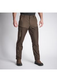 SOLOGNAC - Spodnie outdoor Renfort 100. Kolor: brązowy. Materiał: poliester, materiał, bawełna. Sport: outdoor