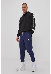 Nike Sportswear - Spodnie. Kolor: niebieski. Materiał: materiał #4