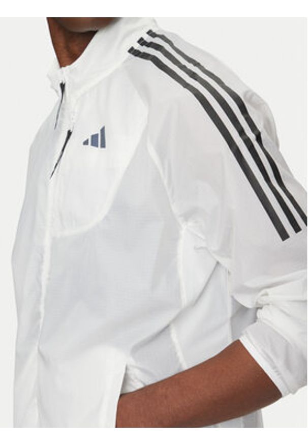 Adidas - adidas Kurtka do biegania Own the Run 3-Stripes JD7760 Biały Slim Fit. Kolor: biały. Materiał: syntetyk. Sport: bieganie