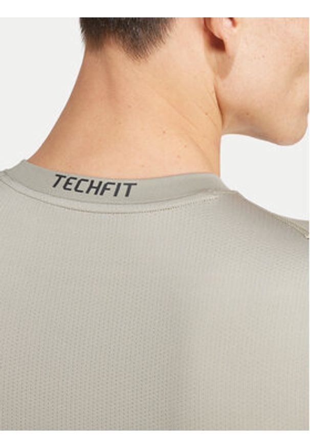 Adidas - adidas Koszulka techniczna Techfit Compression JE6700 Zielony Slim Fit. Kolor: zielony. Materiał: syntetyk. Technologia: Techfit (Adidas)